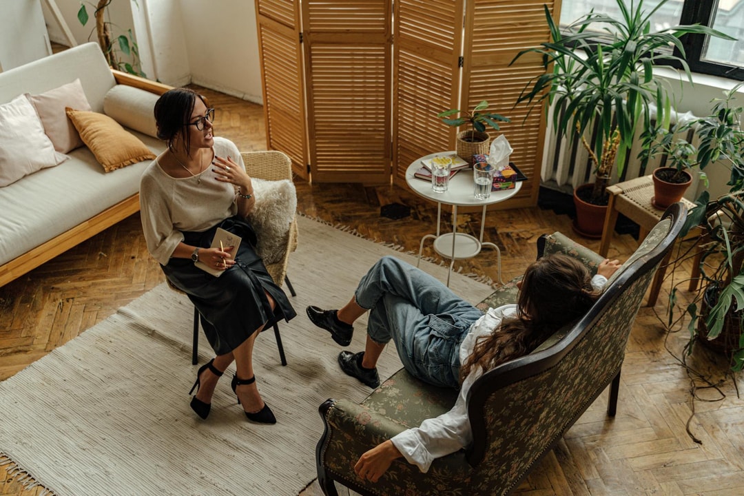 Professional health coach in consultation with client